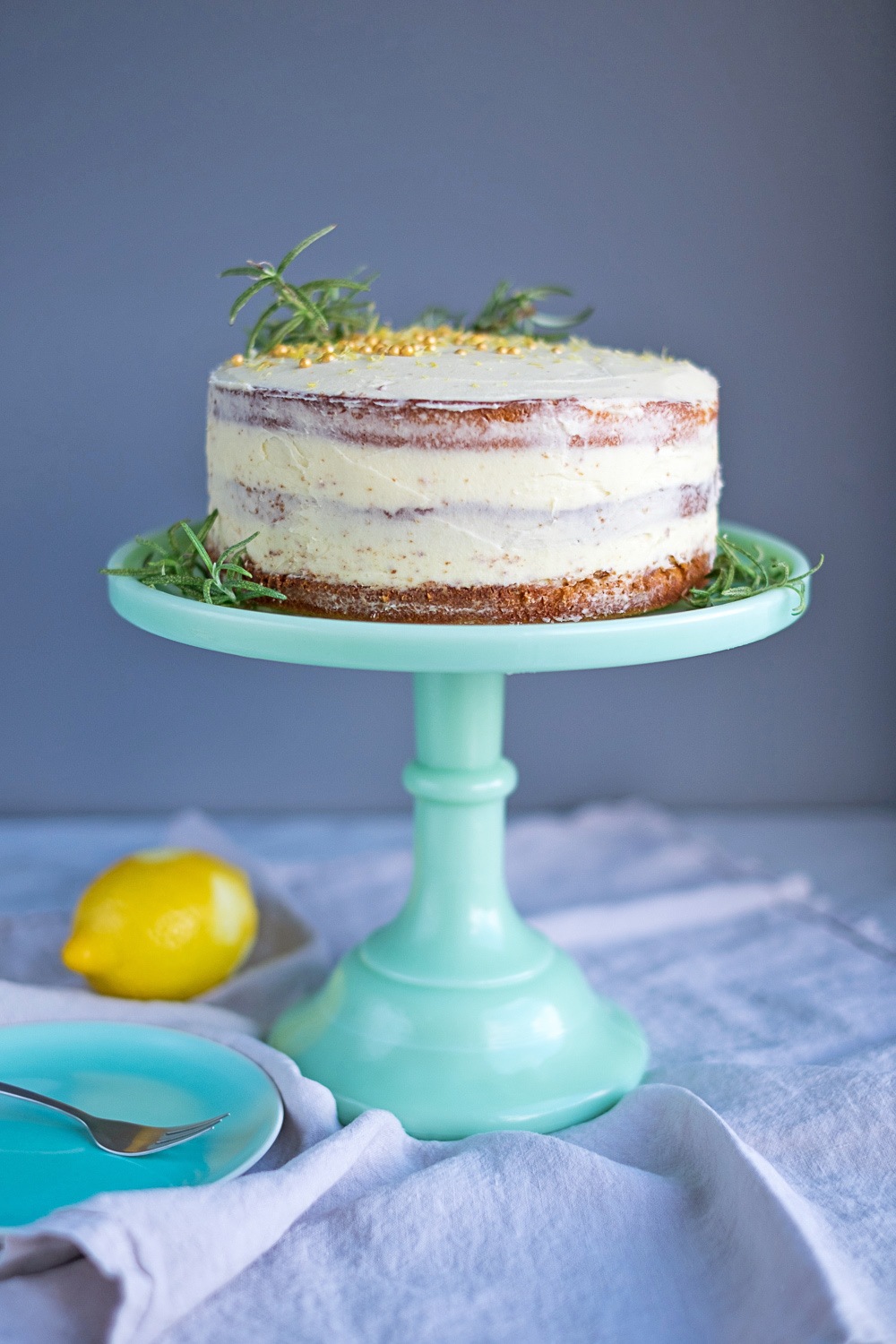 Lemon Cake with Rosemary Buttercream Frosting.
