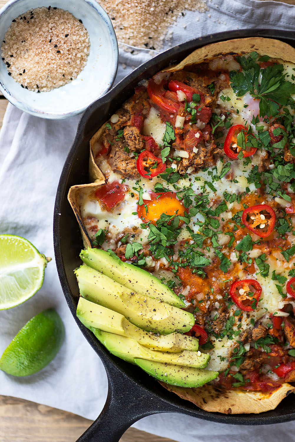 Baked Huevos Rancheros with British Lion Eggs, Refried Black Beans and Avocado