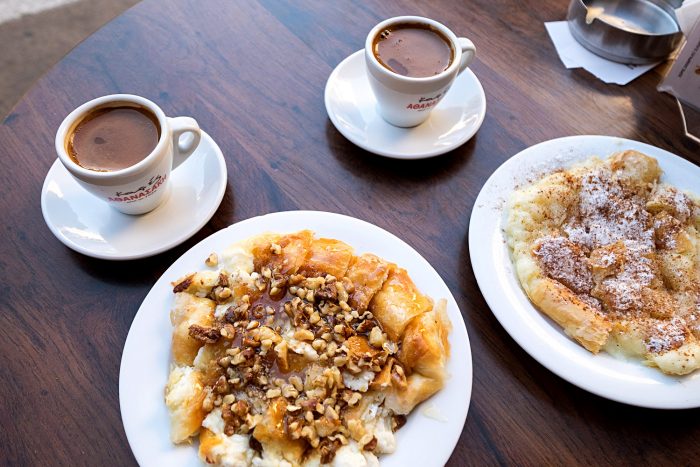 Stop at Fillosofies or Kirkor in Heraklion, Crete. Order Greek coffee and bougatsa, a paper-thin cake made of fillo pastry filled with sweet semolina custard and honey. 