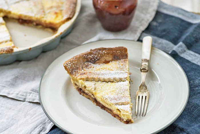 Italian style pastry tart with ricotta cheese and homemade strawberry jam from Rachel Roddy's cookbook Five Quarters. Photography by Giulia Mule (Mondomulia)